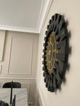 Black Large Wall clock - Real Mirror clock Gold colored numerals on a Black colored mirror,