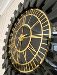 Black Large Wall clock - Real Mirror clock Gold colored numerals on a Black colored mirror,